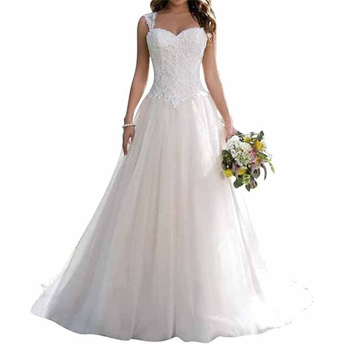 Elegant simple princess wedding dress with lace bodice and flowing tulle skirt for a classic bridal look