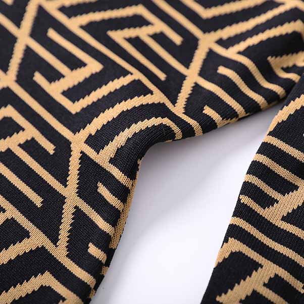 Women's long sleeve knitted minidress Black Yellow striped elegant dress