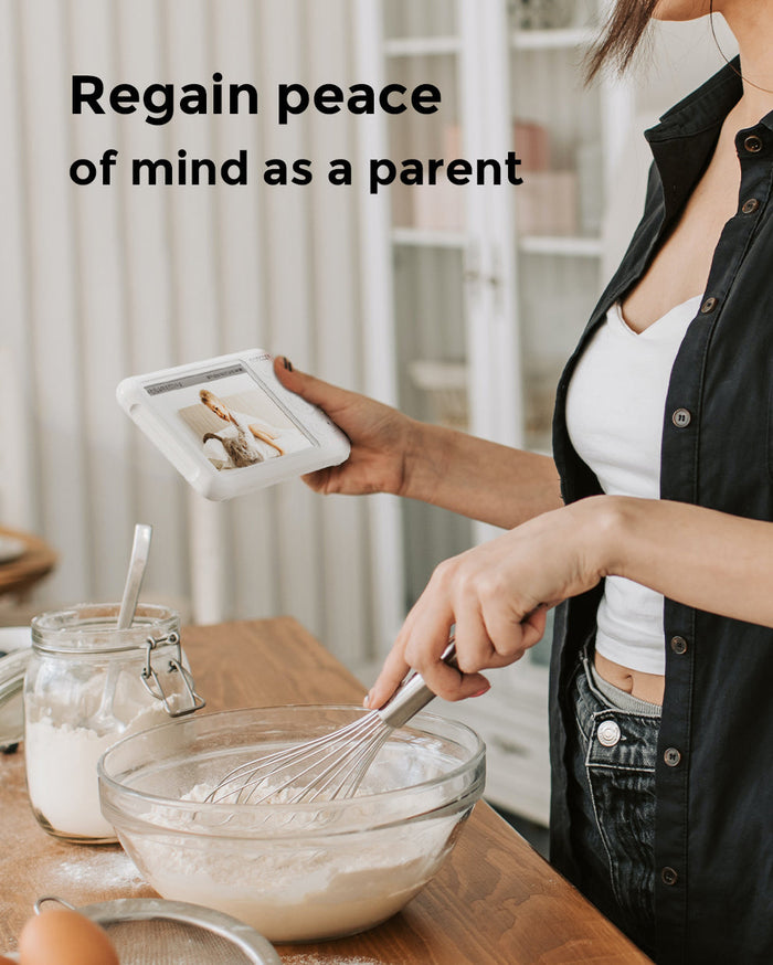 Momcozy 1080P Baby Monitor in use, regaining peace of mind, view baby while baking