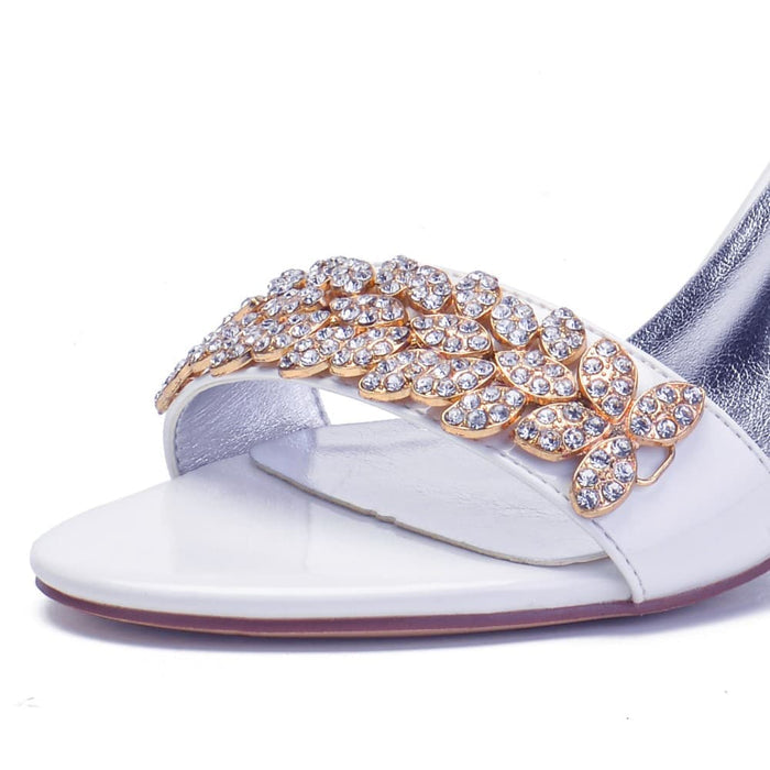 Elegant wedding heels for women featuring a sparkling rhinestone design and a stylish open-toe silhouette