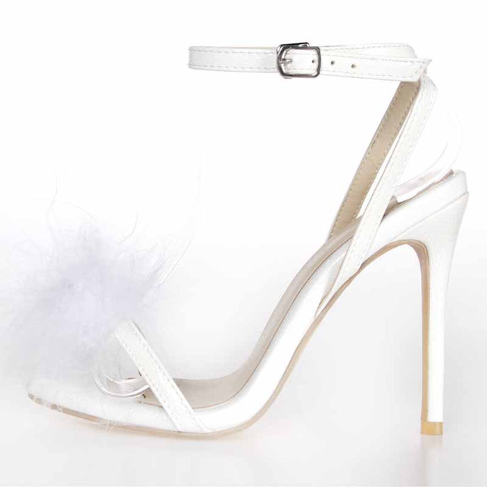 Elegant wedding shoes for bride featuring a sleek design with a delicate feather accent