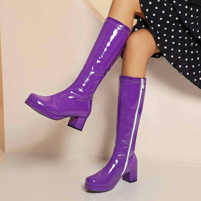 Purple fashion boots with zipper for women featuring a sleek glossy finish and block heels