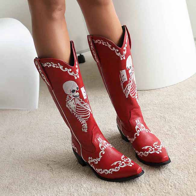 Unique cowgirl boots with embroidery in red featuring skeleton designs for a trendy look