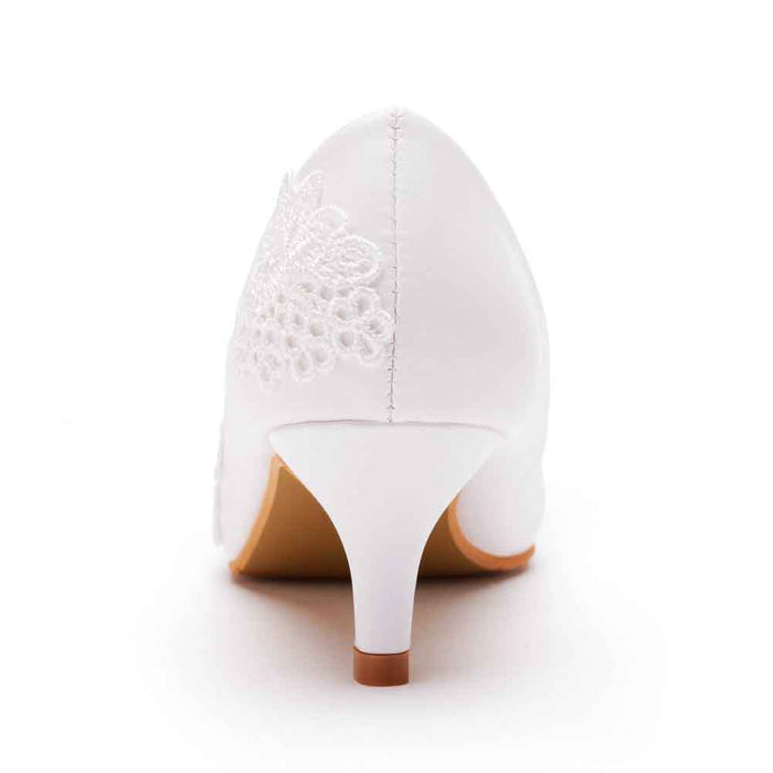 Back view of lace wedding low heel pumps in white with elegant embroidered detailing