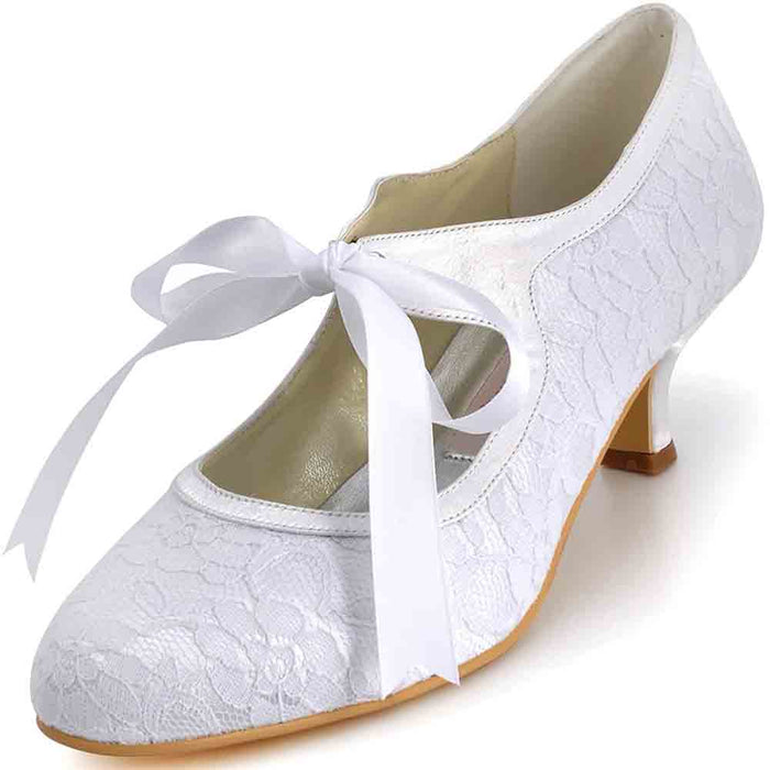 White lace wedding shoes for bride with ribbon detail and a stylish heel