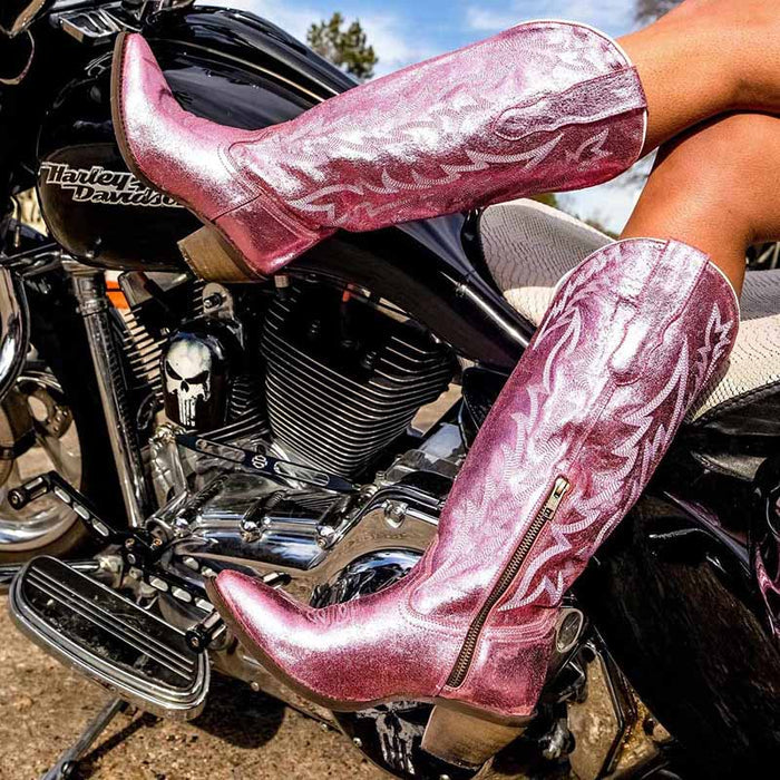 Stylish metallic cowgirl boots for women in shiny pink with intricate design, perfect for riding and fashion