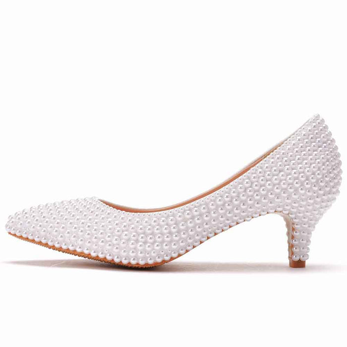 Elegant pearl wedding pumps for brides with a stylish pointed toe and delicate pearl detailing