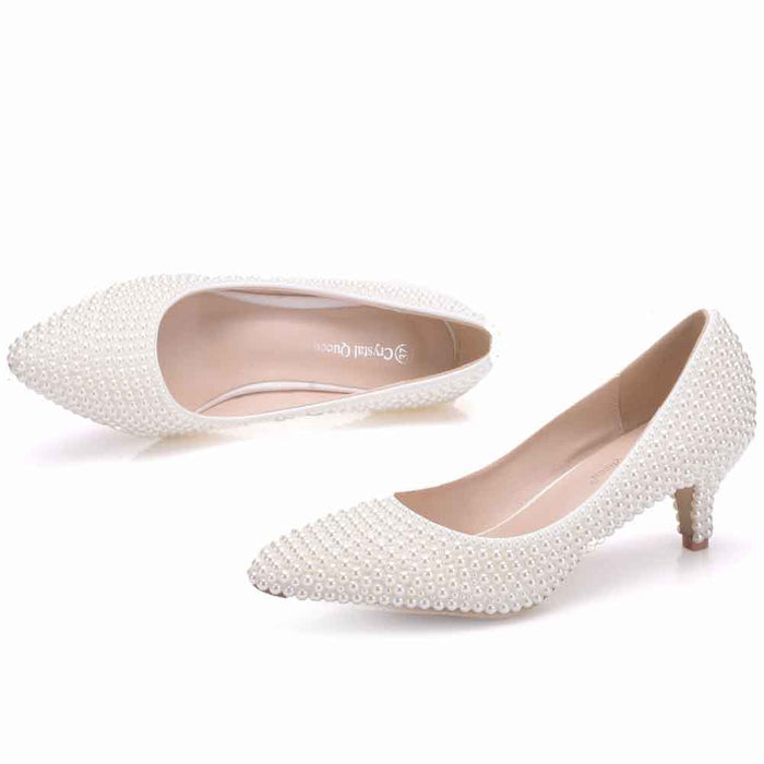 Elegant pearl wedding pumps for brides with stylish pointed toe design and low heel