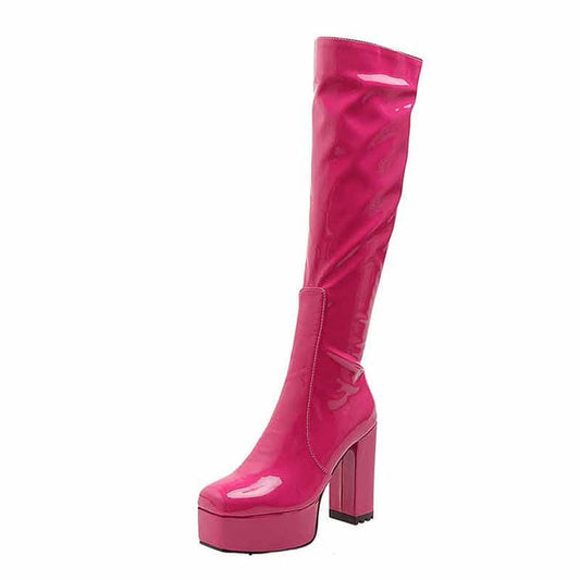 Shiny pink platform high heel boots for women with a sleek knee-high design
