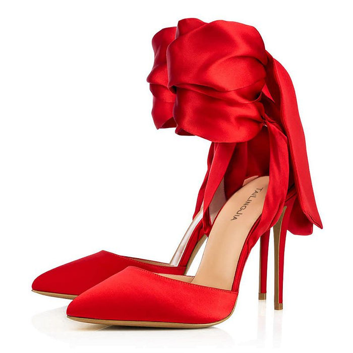 Stunning red satin bow high heels featuring a chic pointed toe and a dramatic bow detail for elegant styling