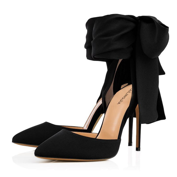 Elegant black high heels with a satin bow detail, perfect for formal occasions and stylish outfits