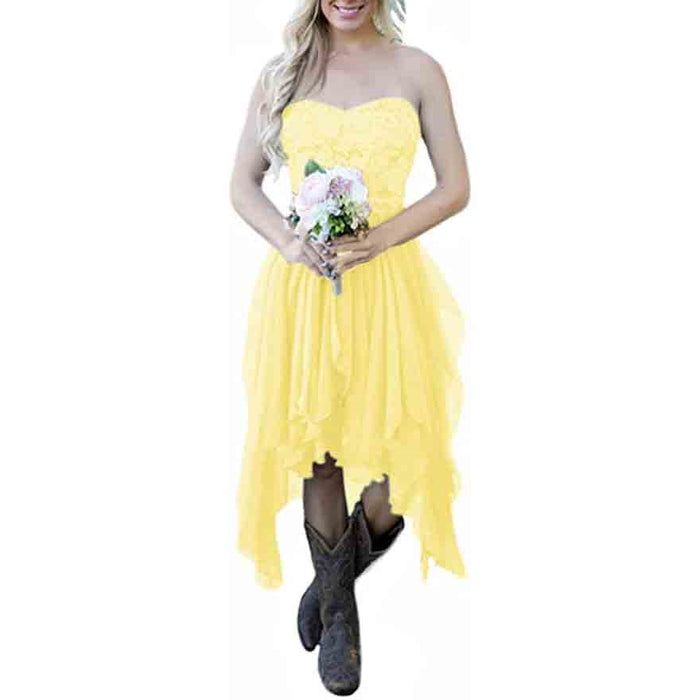 Yellow strapless rustic bridesmaid dress for women with a flowing hem and cowboy boots