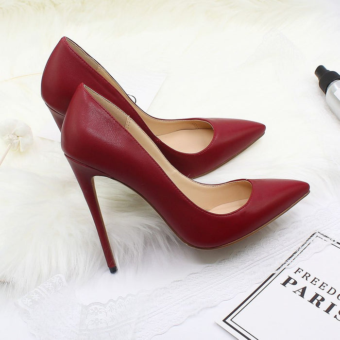Elegant high heel shoes for weddings in red with a sleek pointed toe design
