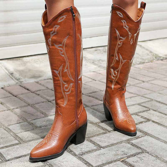Stylish embroidered knee high boots for women in brown with intricate designs and a sturdy heel