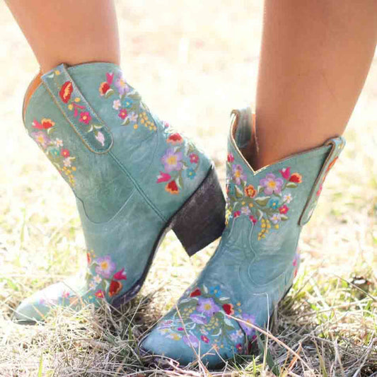 Embroidered western blue ankle boots for women with colorful floral designs and a stylish heel