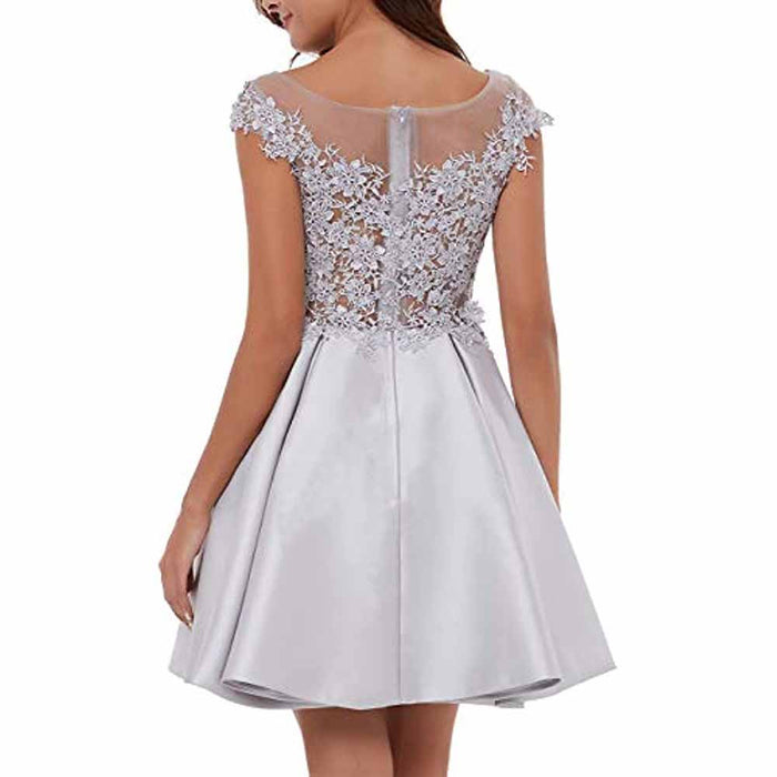Elegant lace applique homecoming dress with a fitted bodice and flared skirt in light silver.