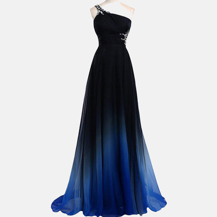 Elegant one shoulder ombre prom dress in black fading to blue with embellishments on bodice