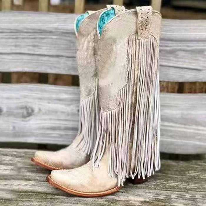 Stylish women's fringe western boots in beige with detailed fringe design and a pointed toe
