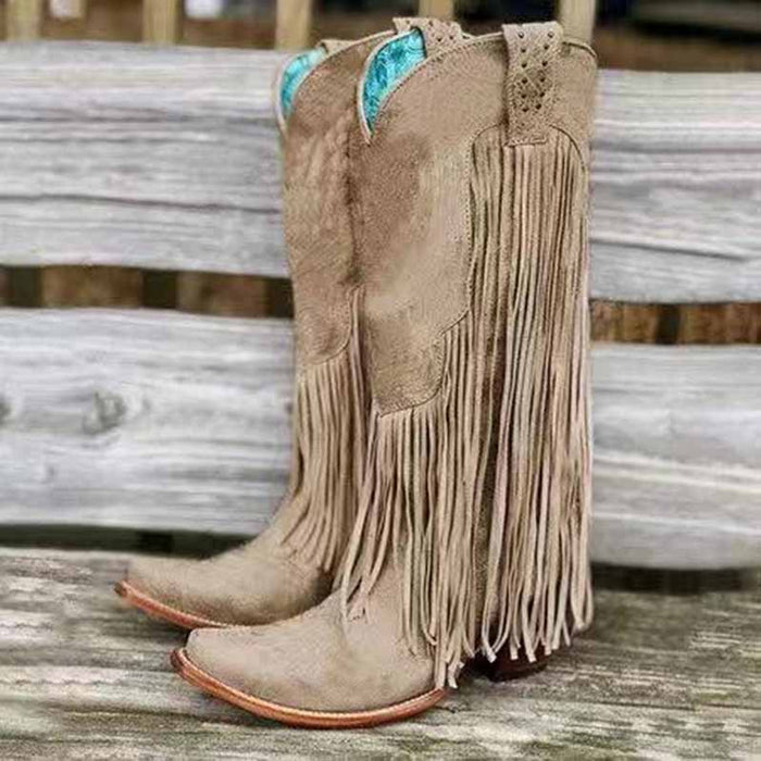 Stylish women's fringe western boots in beige with decorative detailing and a pointed toe design