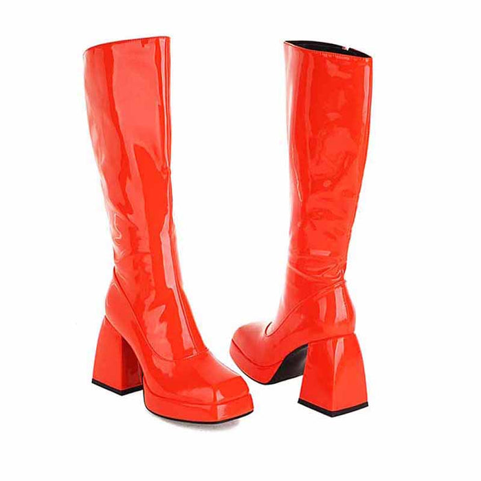 Stylish red women's knee high boots with chunky heel for a bold fashion statement