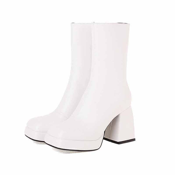 Stylish white women's patent leather ankle boots with chunky heels for a trendy look
