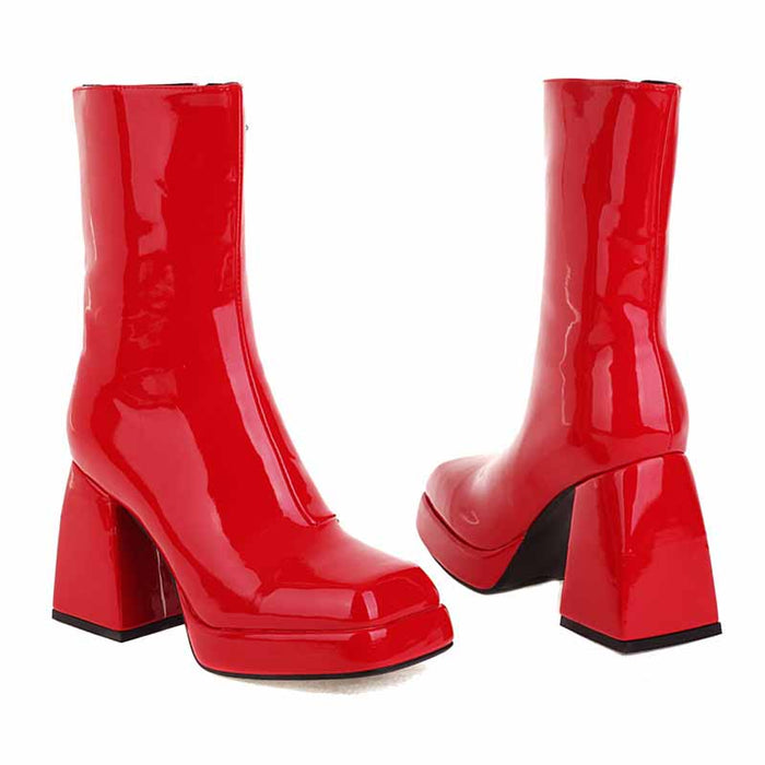 Bold red women's patent leather ankle boots with chunky heels for a stylish look
