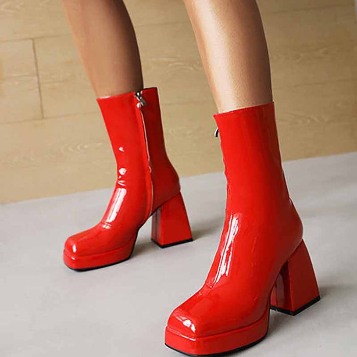 Stylish red women's patent leather ankle boots with block heels and zipper closure