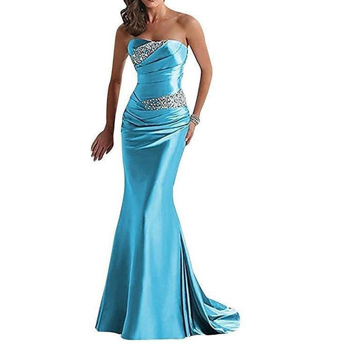 Elegant strapless beaded mermaid evening dress in blue with a fitted silhouette and shimmering bodice