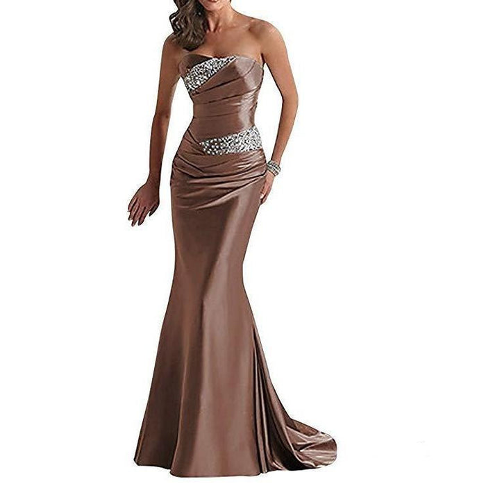 Elegant beaded mermaid evening dress in bronze with a strapless design and fitted silhouette