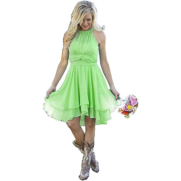 Light green cowgirl bridesmaid dress for rustic wedding with a flowing skirt and halter neckline