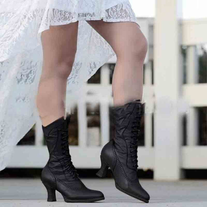 Stylish women's lace up bridal boots in black, perfect for unique wedding attire