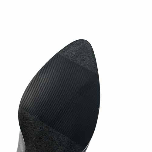 Sole of women's low heeled wedding boots featuring a durable and textured design for stability
