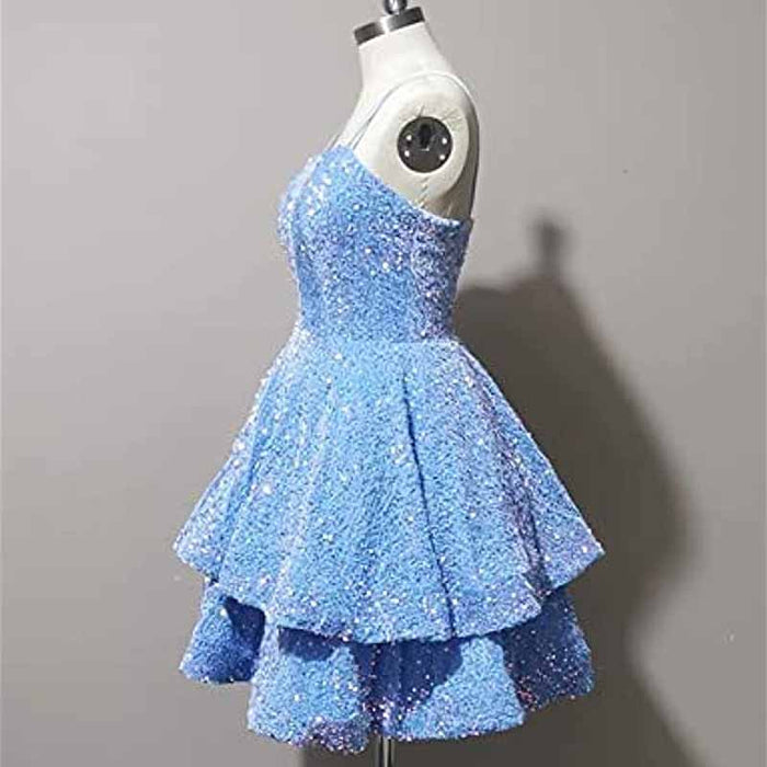Sparkly short homecoming dress in light blue with tiered skirt and shimmering details