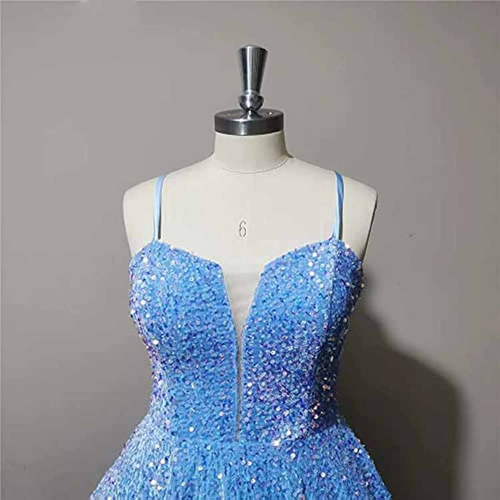 Sparkly short homecoming dress in blue with a deep V-neckline and shimmering sequins