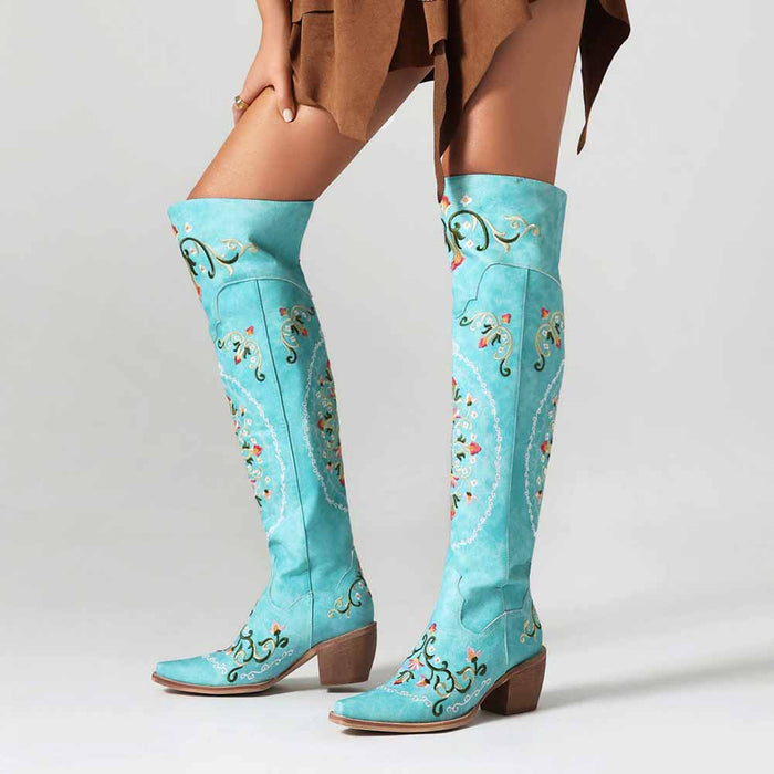 Unique embroidered cowboy boots women in turquoise with intricate floral designs and a stylish heel