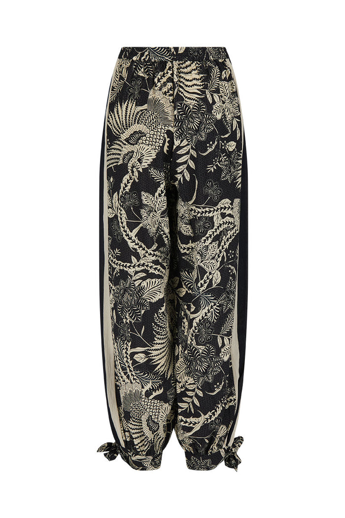 Volcano Goddess Harem Pant in Liquorice, back flat lay showing side stripe detail and tie hem cuffs