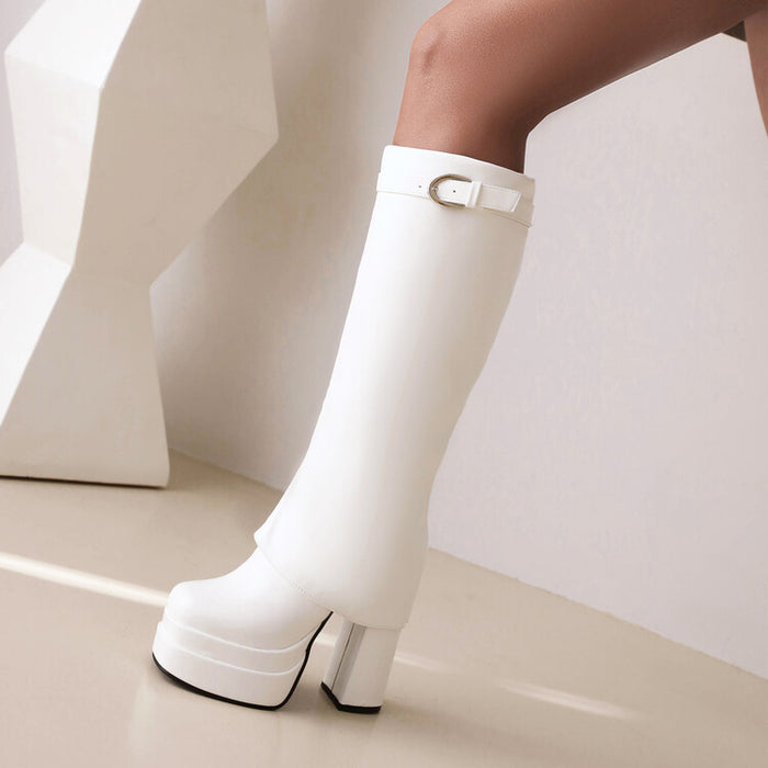 White waterproof chunky platform boots with a thick heel and buckle detail for stylish rainwear