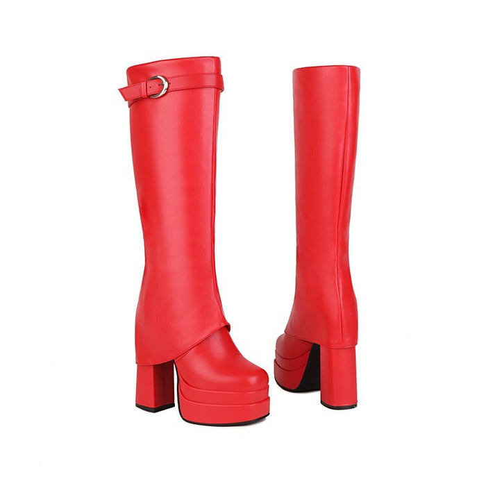 Bold red waterproof chunky platform boots with a high heel and stylish buckle detail