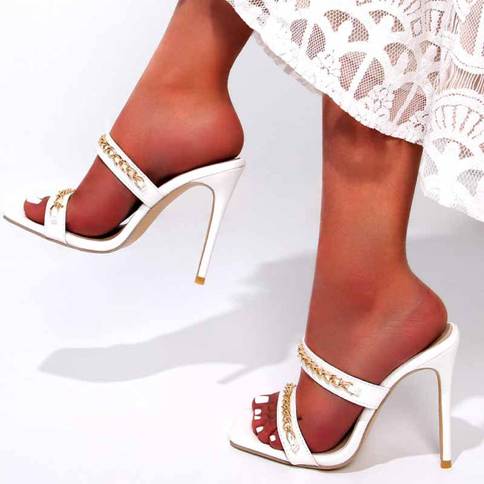 Elegant white wedding heels for summer bride with gold detailing and stylish design