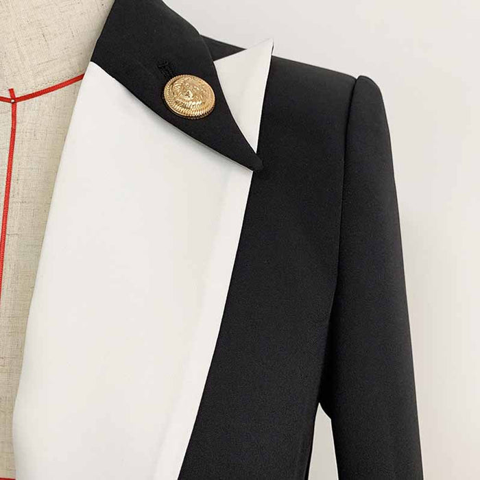 Elegant White Collar Blazer Black Jacket with a Stylish Brooch and Tailored Design