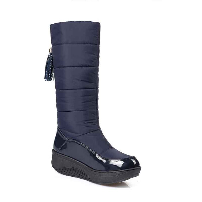 Women's waterproof snow boots in navy blue with padded design for winter warmth and comfort