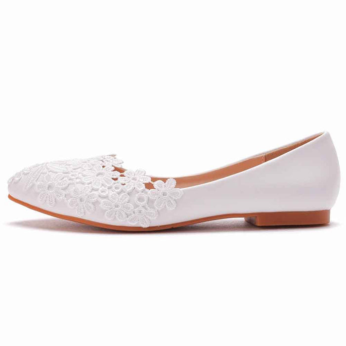 Elegant women's bridal flats with floral embroidery design in white for stylish brides