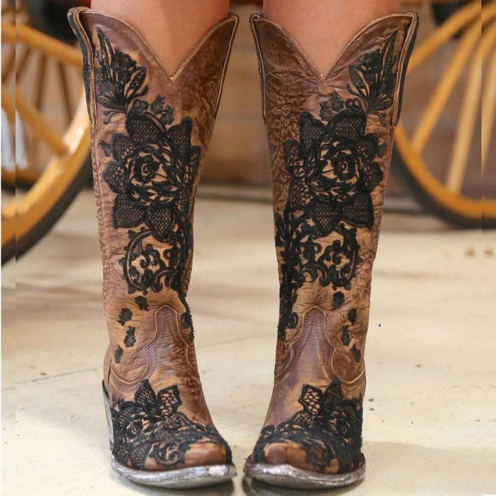 Women's embroidered cowboy boots with detailed floral designs and a stylish pointed toe
