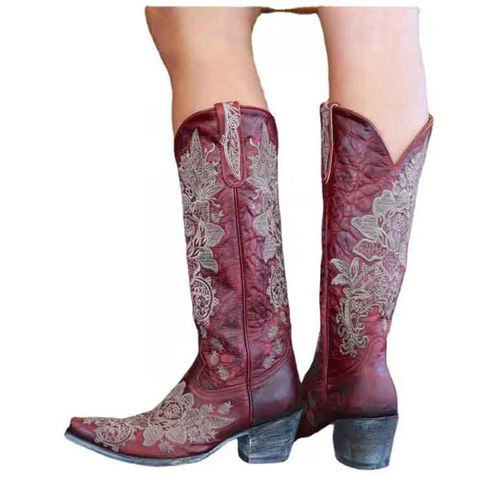 Stylish women's embroidered cowboy boots in red with intricate floral designs and a classic silhouette