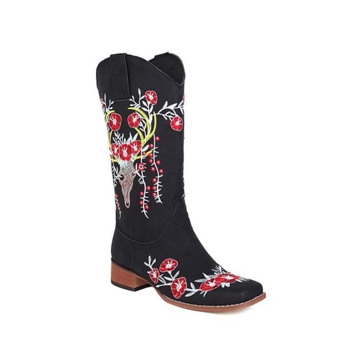 Women's embroidered cowgirl boots in black with colorful floral and antler design