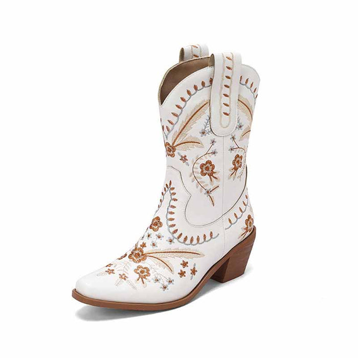 Stylish women's embroidered cowgirl boots in white with beautiful floral patterns and a stacked heel