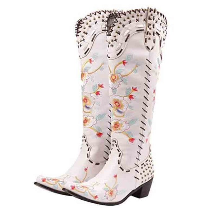 Women's embroidered western cowboy boots in white with floral designs and intricate stitching.