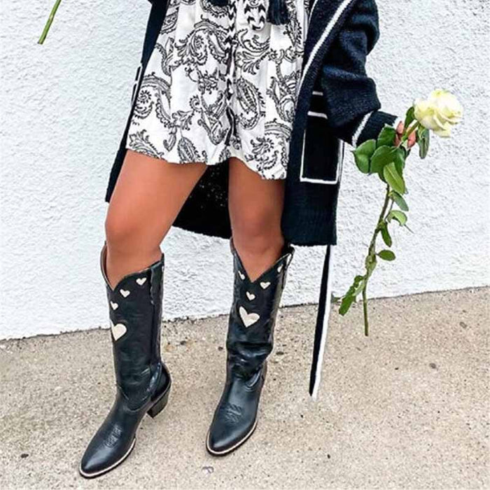 Women's embroidery heart cowgirl boots featuring heart designs on a stylish black leather finish