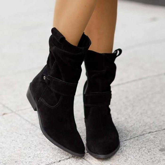 Stylish black women's flat heel calf boots with slouch design and buckle detail for a chic look
