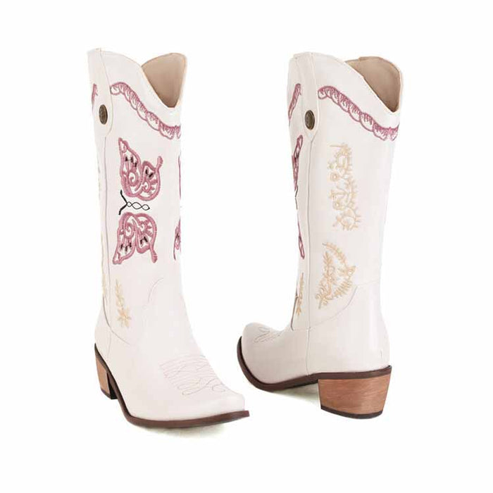 Tucomosi women's floral embroidery cowgirl boots in white with butterfly designs and a stylish heel